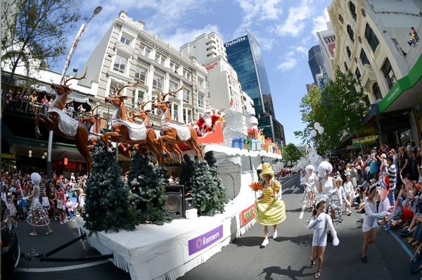 Santa's float journeys down Queen Street at the 2012 Farmers Santa Parade.
